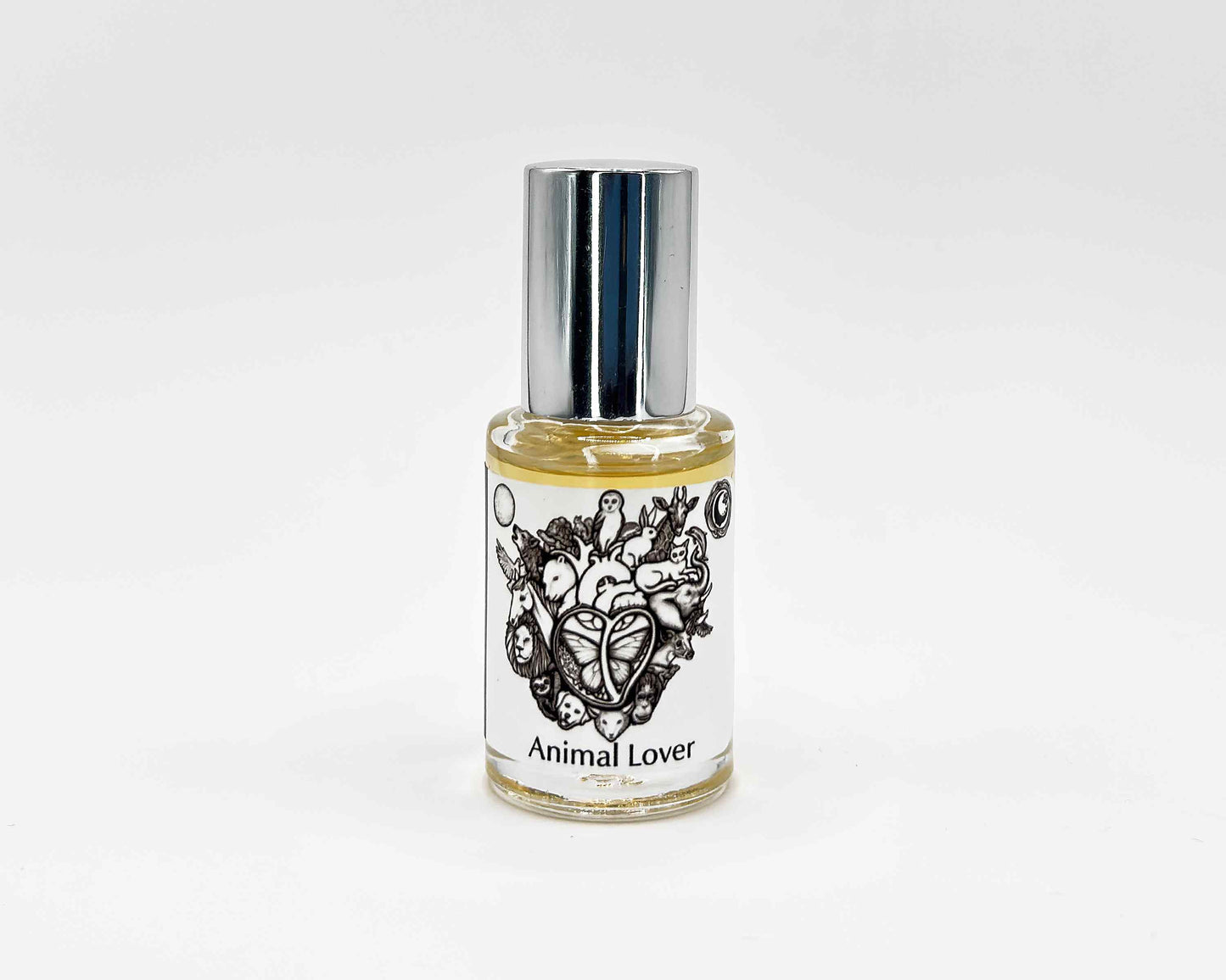 Animal Lover Fragrance 5mL bottle. Cylindrical clear glass with Animal Lover Collection artwork label and a cylindrical silver top.