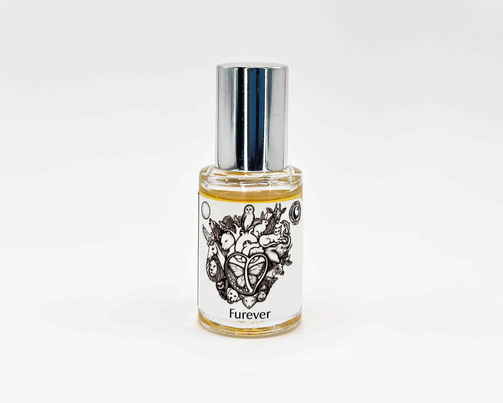 Furever Fragrance 5mL bottle. Cylindrical clear glass with Animal Lover Collection artwork label and a cylindrical silver top.
