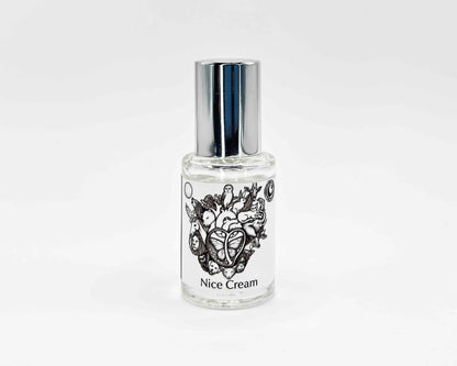 Nice Cream Fragrance 5mL bottle. Cylindrical clear glass with Animal Lover Collection artwork label and a cylindrical silver top.