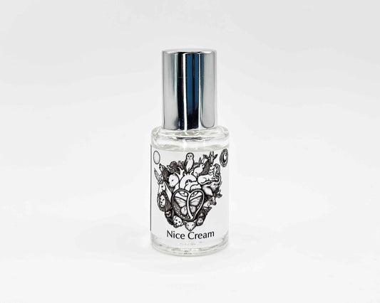 Nice Cream Fragrance 5mL bottle. Cylindrical clear glass with Animal Lover Collection artwork label and a cylindrical silver top.