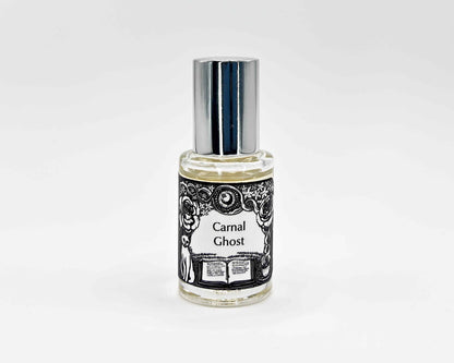 Carnal Ghost Fragrance 5mL bottle. Cylindrical clear glass with Get Lit Collection artwork label and a cylindrical silver top.