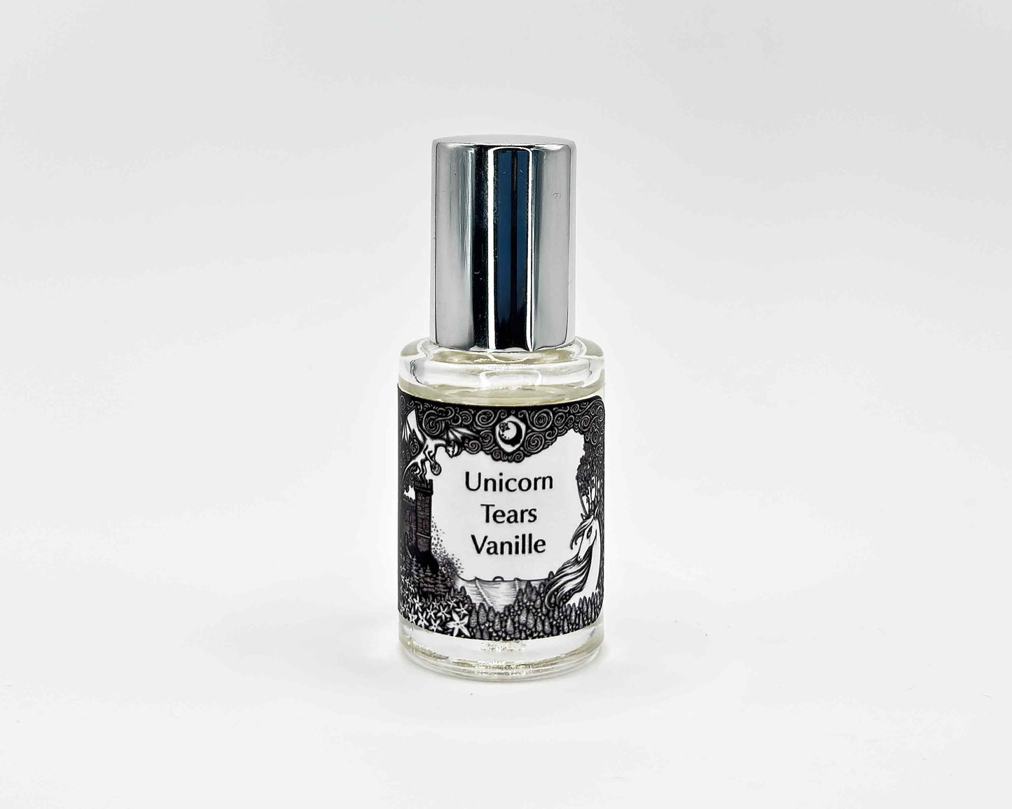 Unicorn Tears Vanille Fragrance 5mL bottle. Cylindrical clear glass with Lost Fairytale Collection artwork label and a cylindrical silver top.