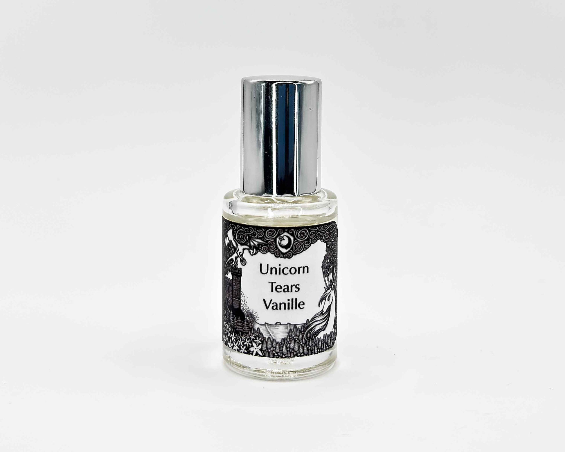Unicorn Tears Vanille Fragrance 5mL bottle. Cylindrical clear glass with Lost Fairytale Collection artwork label and a cylindrical silver top.